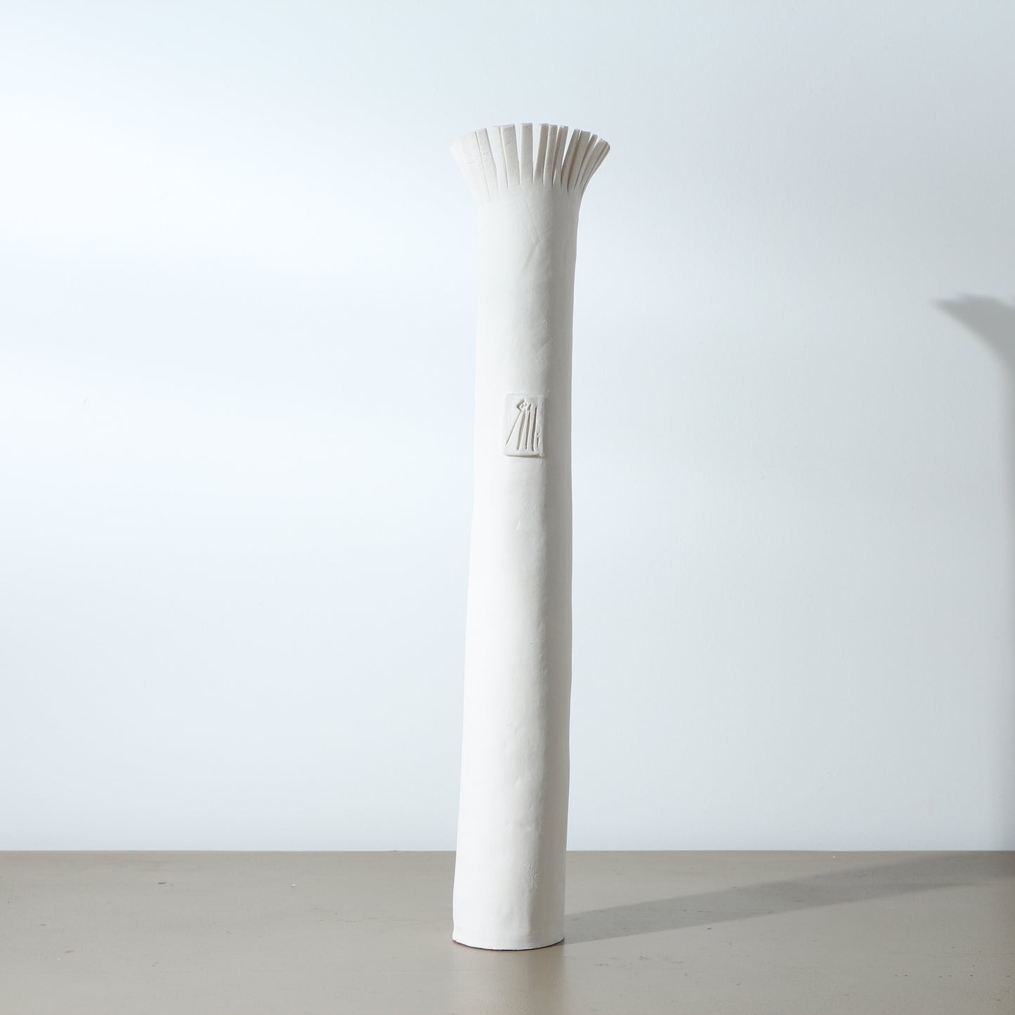 Soliflore en porcelaine frangé