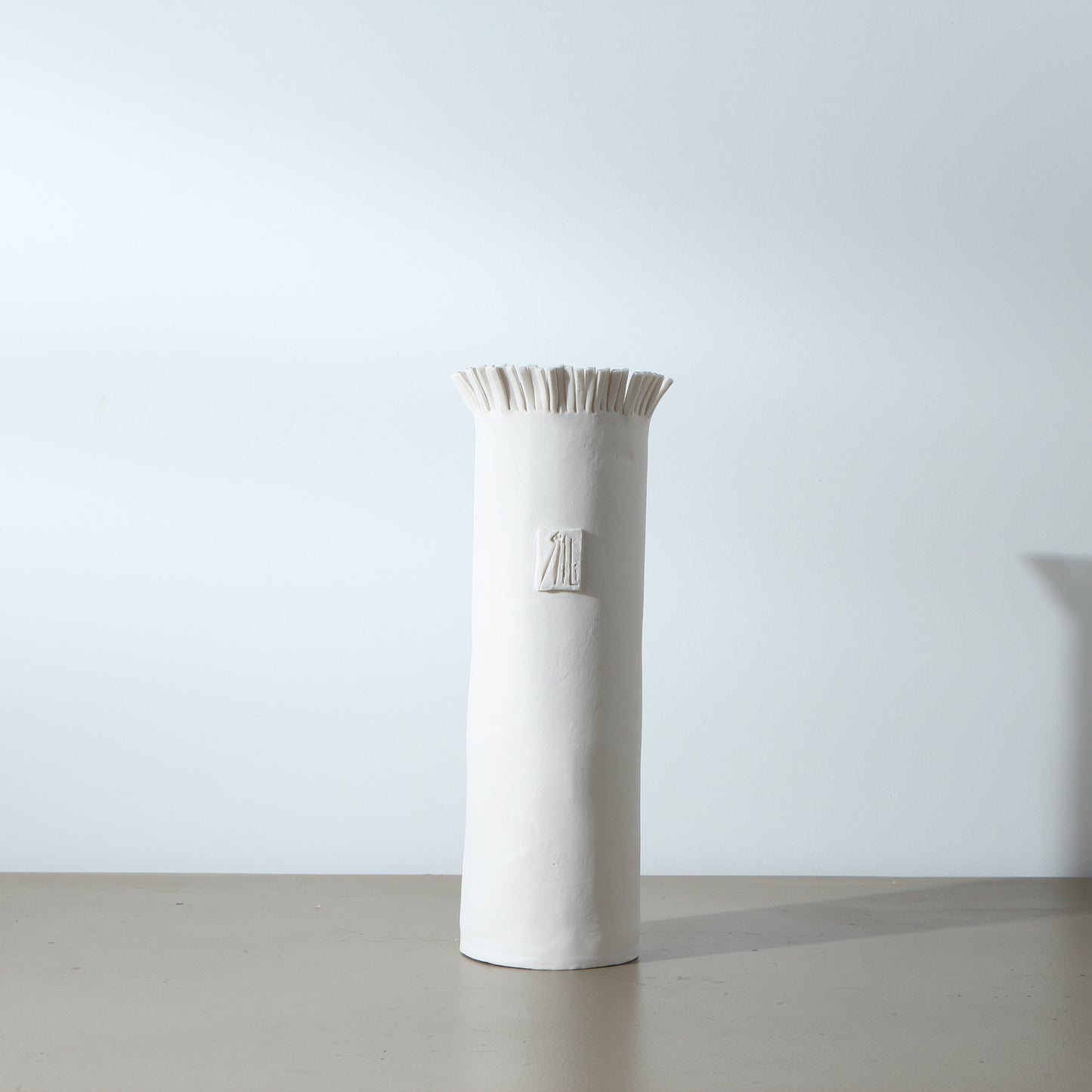 Vase en porcelaine frangé