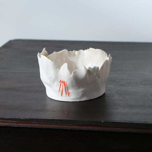 Petit pot porcelaine déchirée signature orange