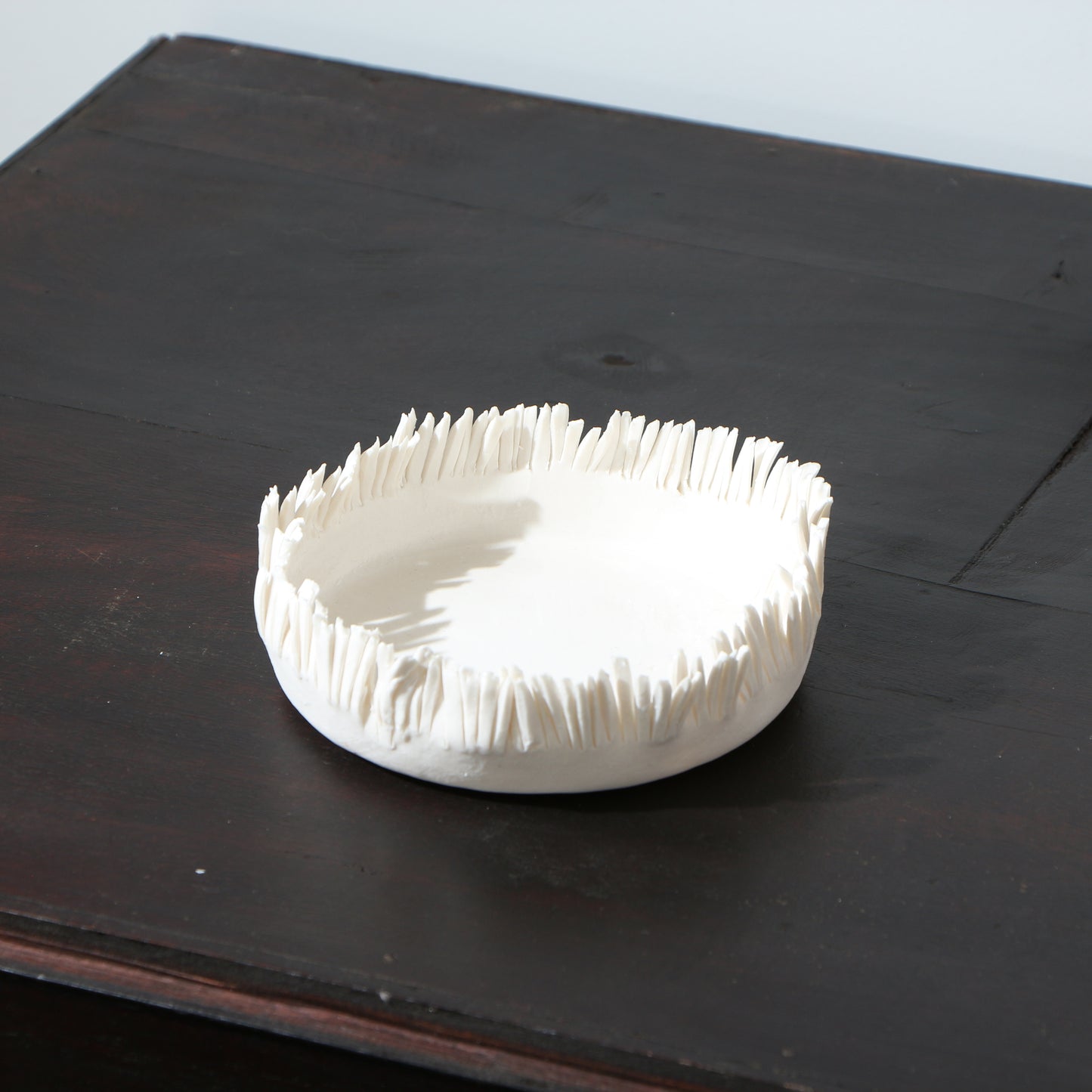 Coupelle frangée en porcelaine