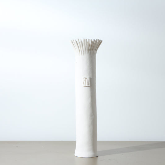 Soliflore en porcelaine frangé