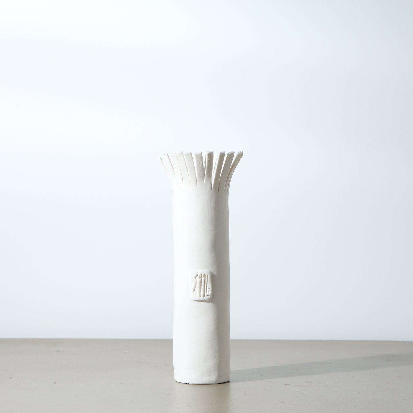 Soliflore en porcelaine frangé