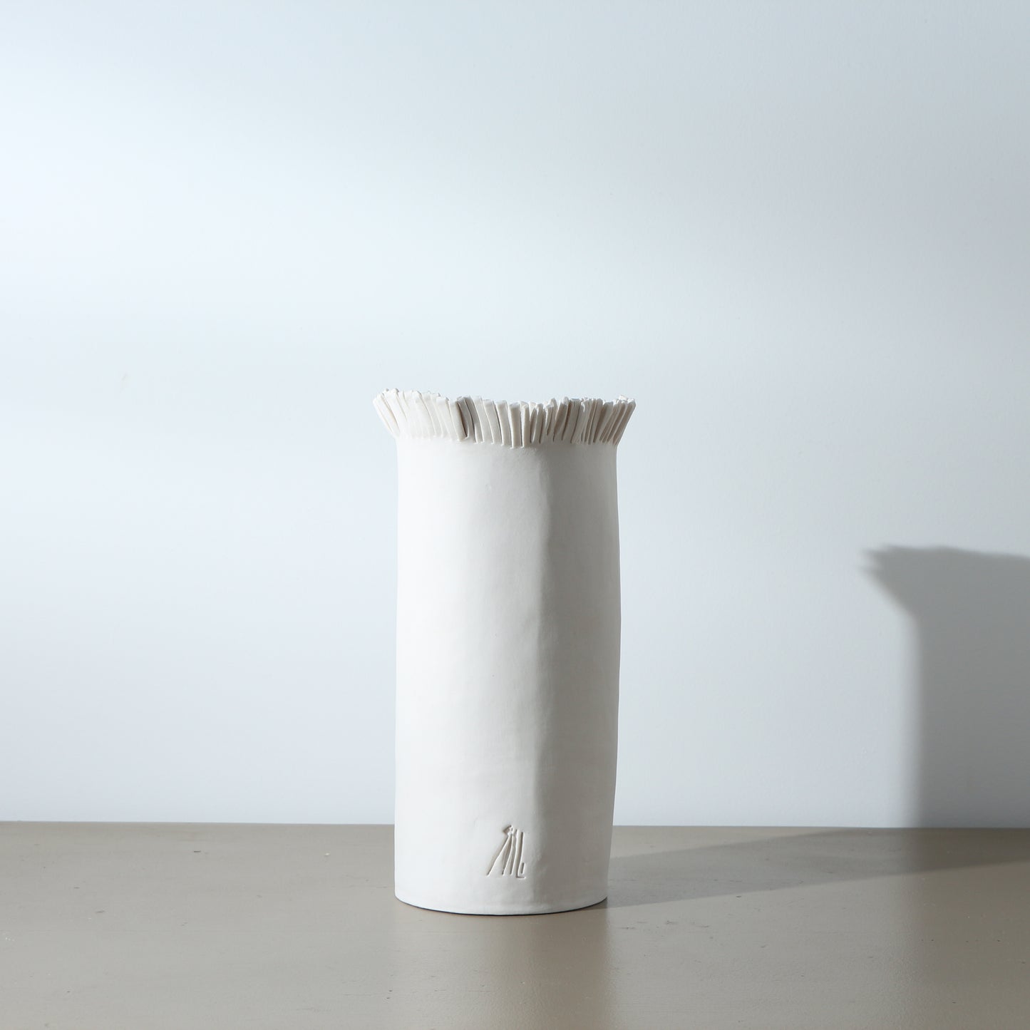 Vase en porcelaine frangé