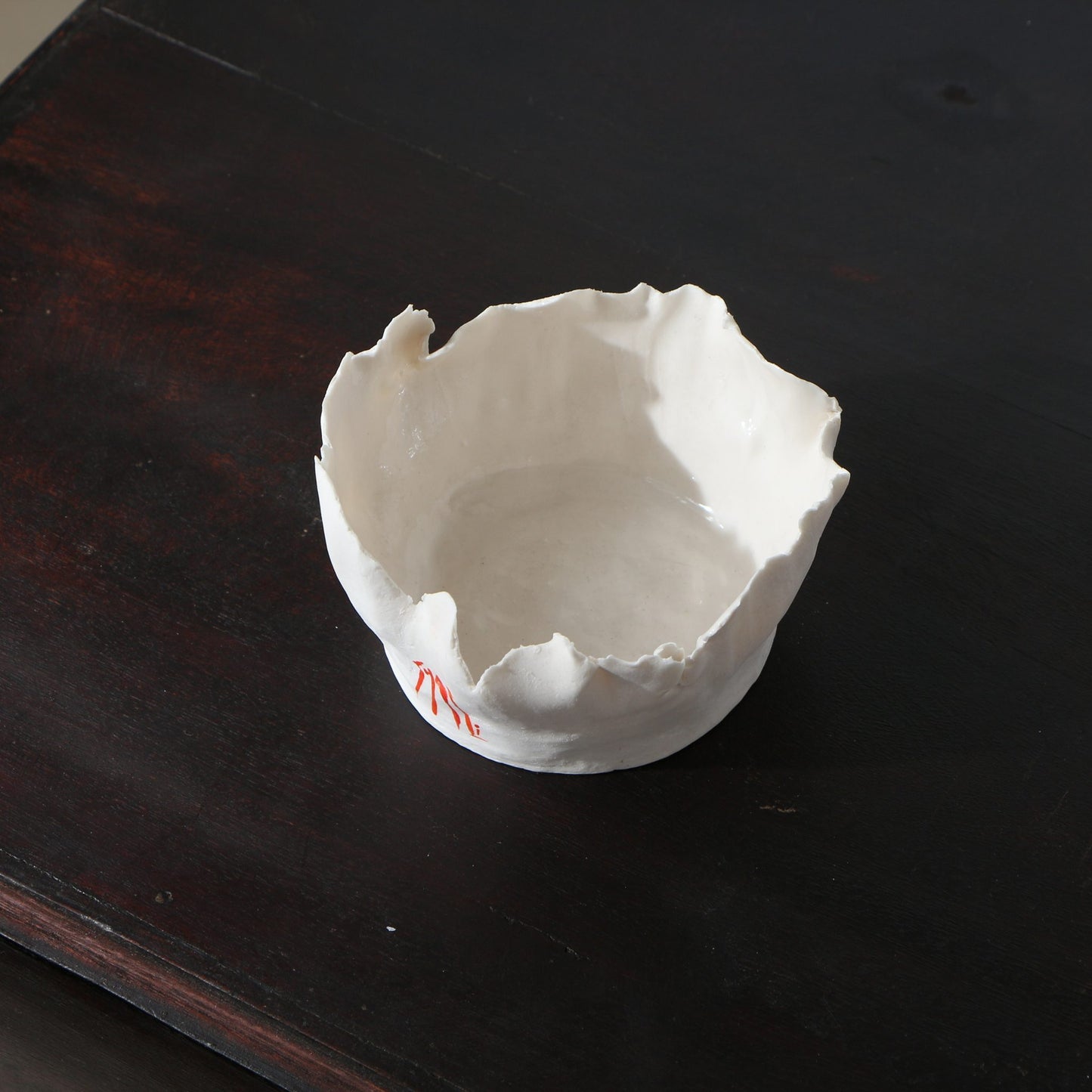 Petit pot porcelaine déchirée signature orange