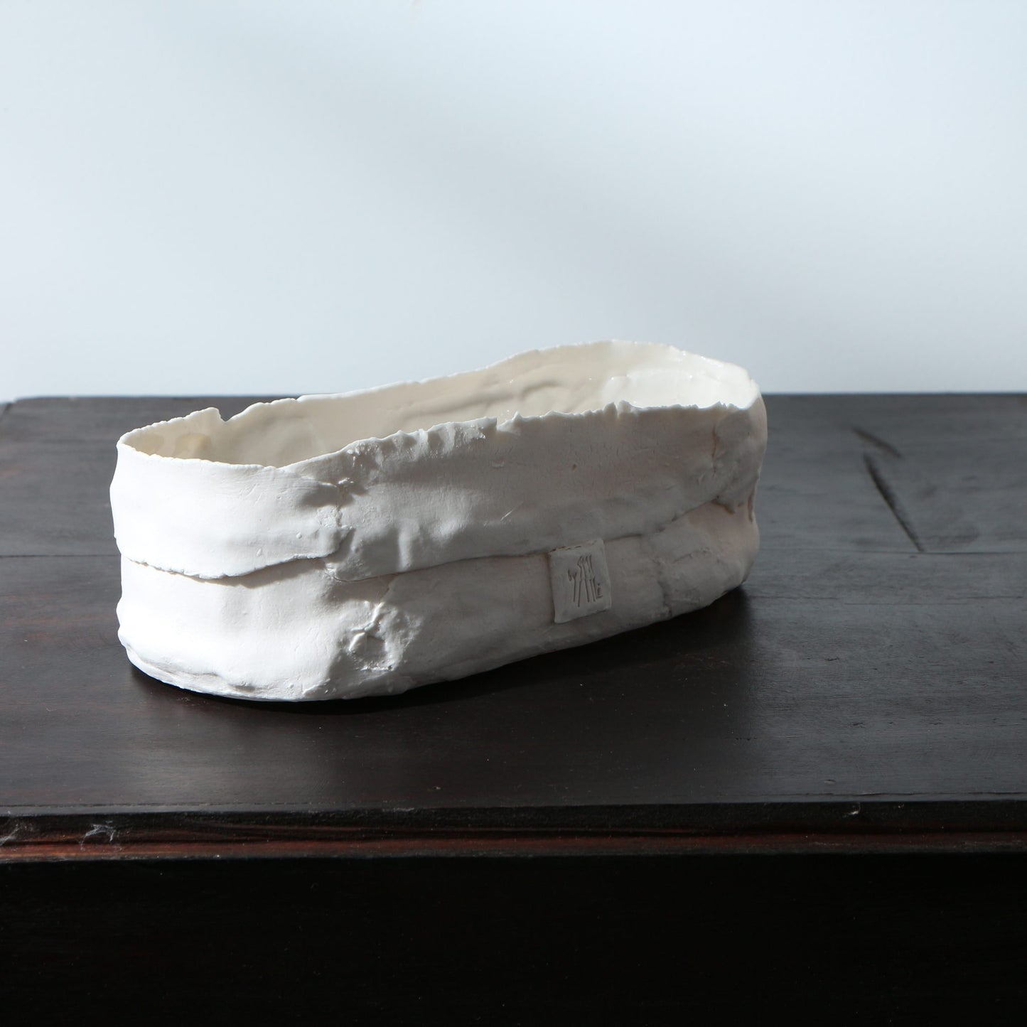 Plat ovale porcelaine lanières déchirées