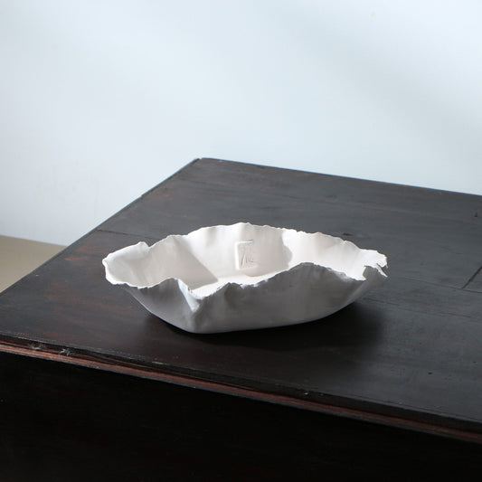 Plat ovale porcelaine volantée déchirée