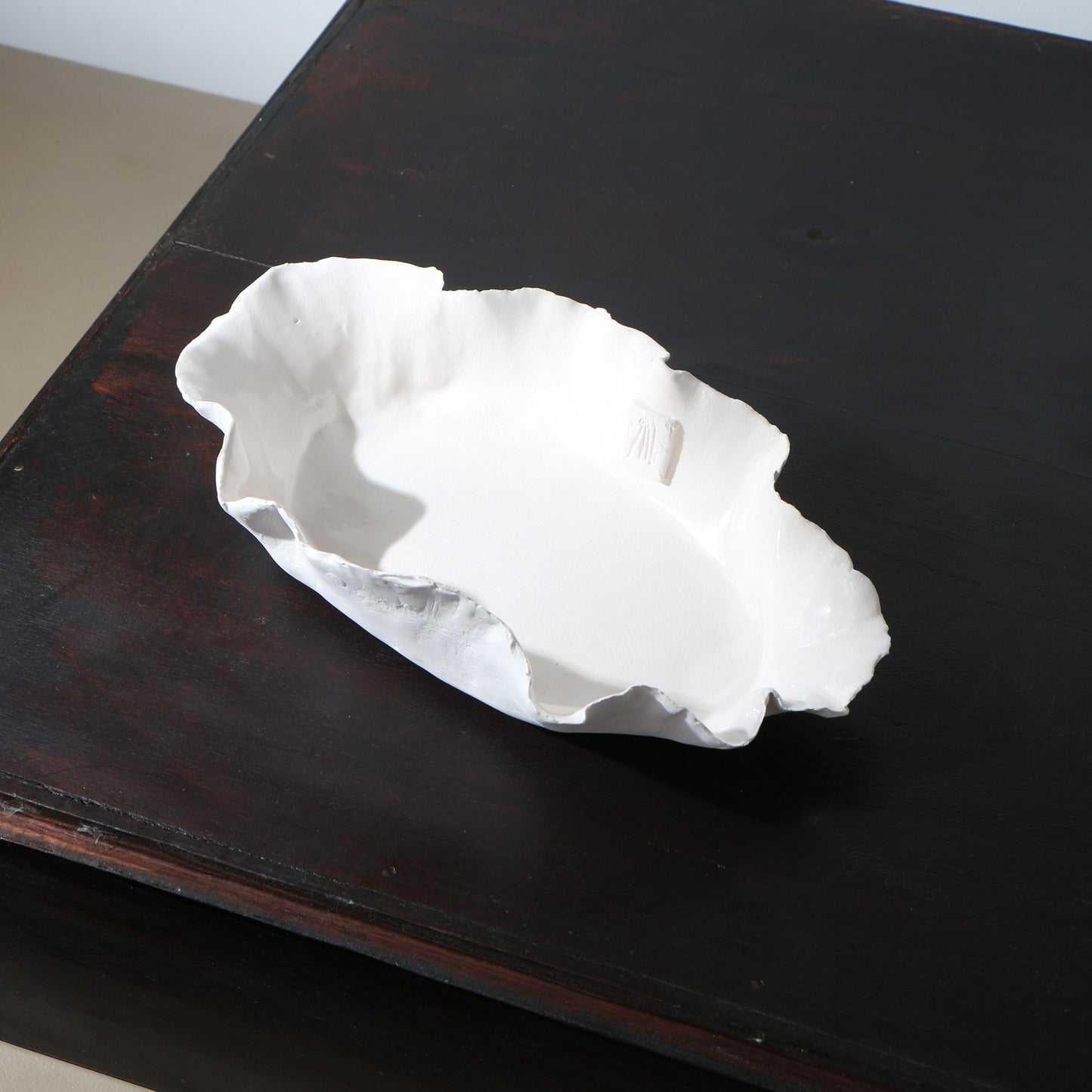 Plat ovale porcelaine volantée déchirée